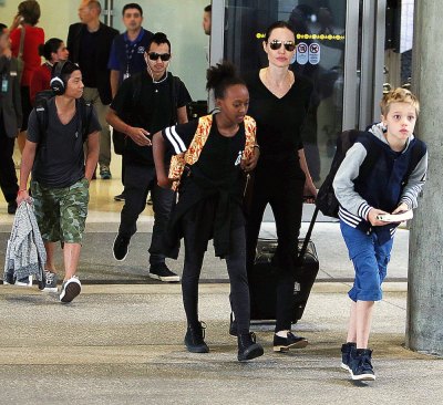 Angelina Jolie and her son Maddox Jolie-Pitt arriving at LAX