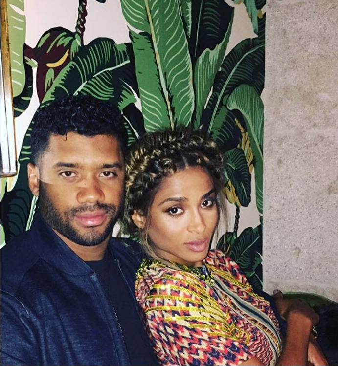 Ciara snuggles with Russell Wilson after revealation she's suing