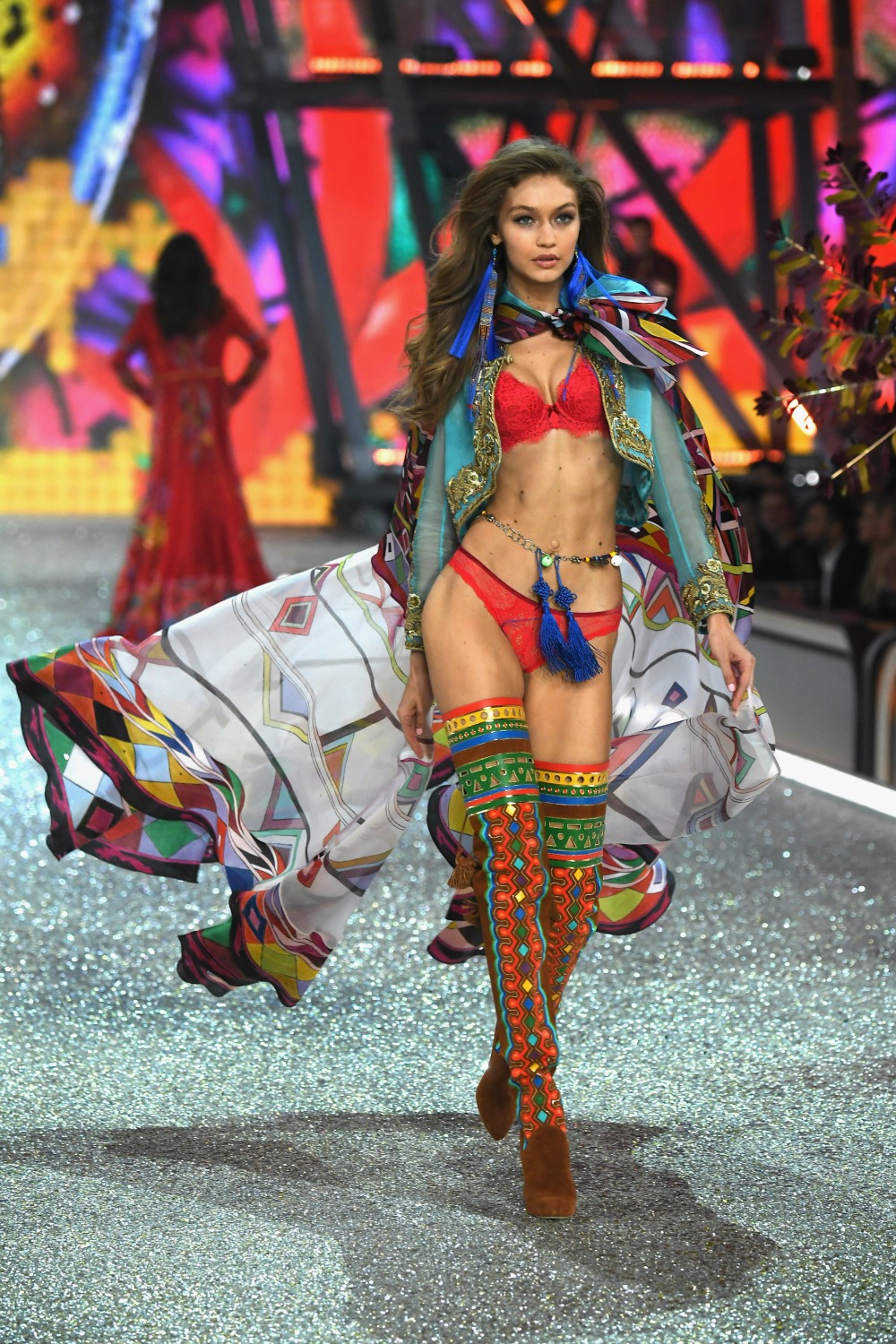 Victoria's Secret stars suffer wardrobe malfunctions as Gigi Hadid's bra  pops opens and Irina Shayk and Adriana Lima flash their bums on the runway