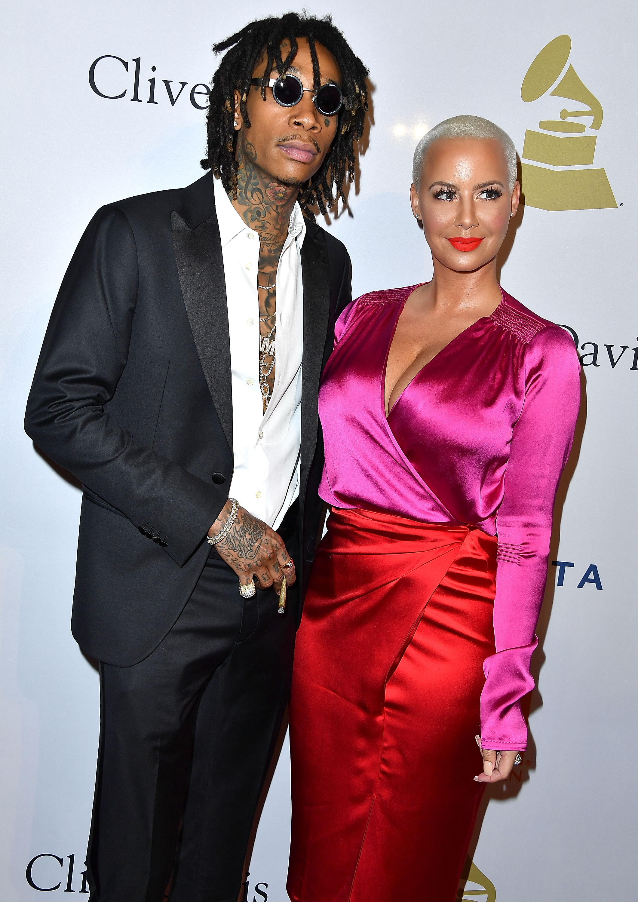 Amber Rose tells fans to STFU about her forehead tattoo