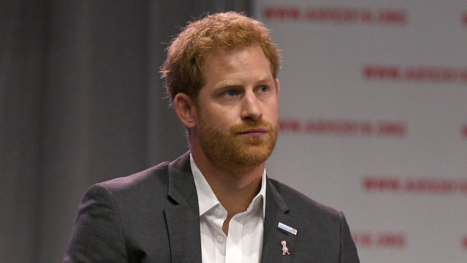 Prince Harry Photographed With a Giant Hole in His Shoe | Life & Style