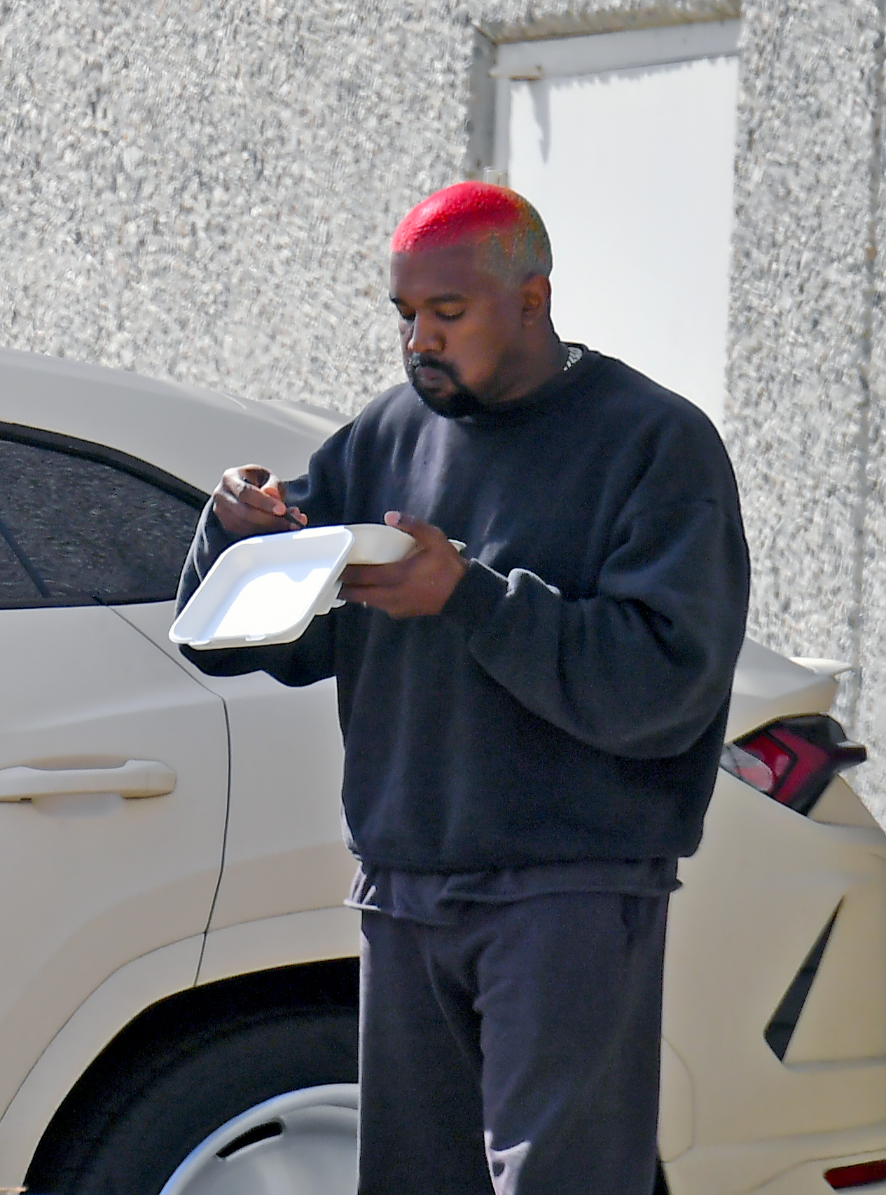 Kanye West Eats His Lunch on the Go in Stylish Sweatpants: Pics!