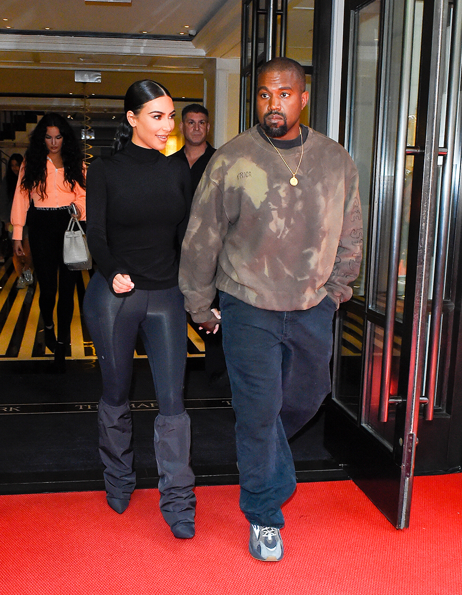 Kim Kardashian and Kanye West leave their hotel and head to the