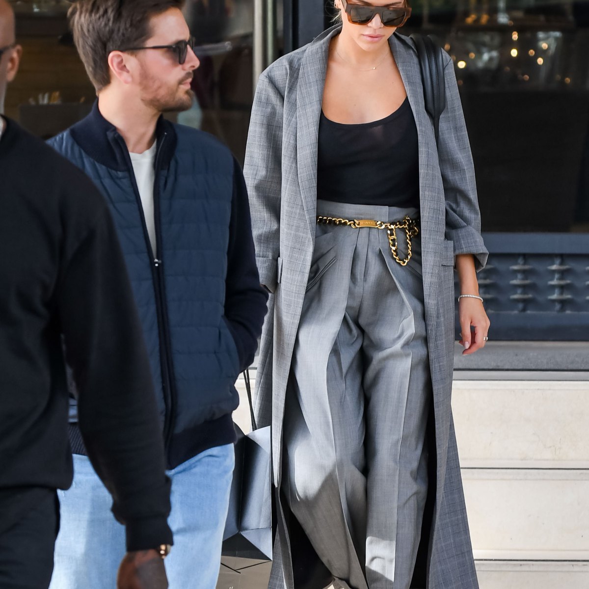 Sofia Richie looks stylish in a Fendi turtleneck and jeans while she and Scott  Disick shop at Prada