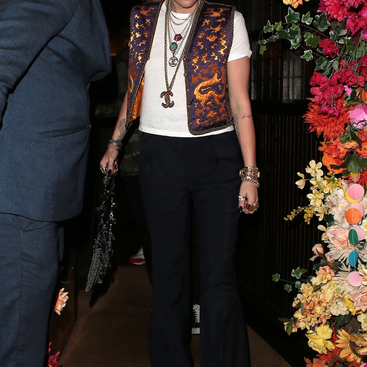 Miley Cyrus Louis Vuitton Silver Pleated Top & Tuxedo Pants Look for Less -  The Budget Babe