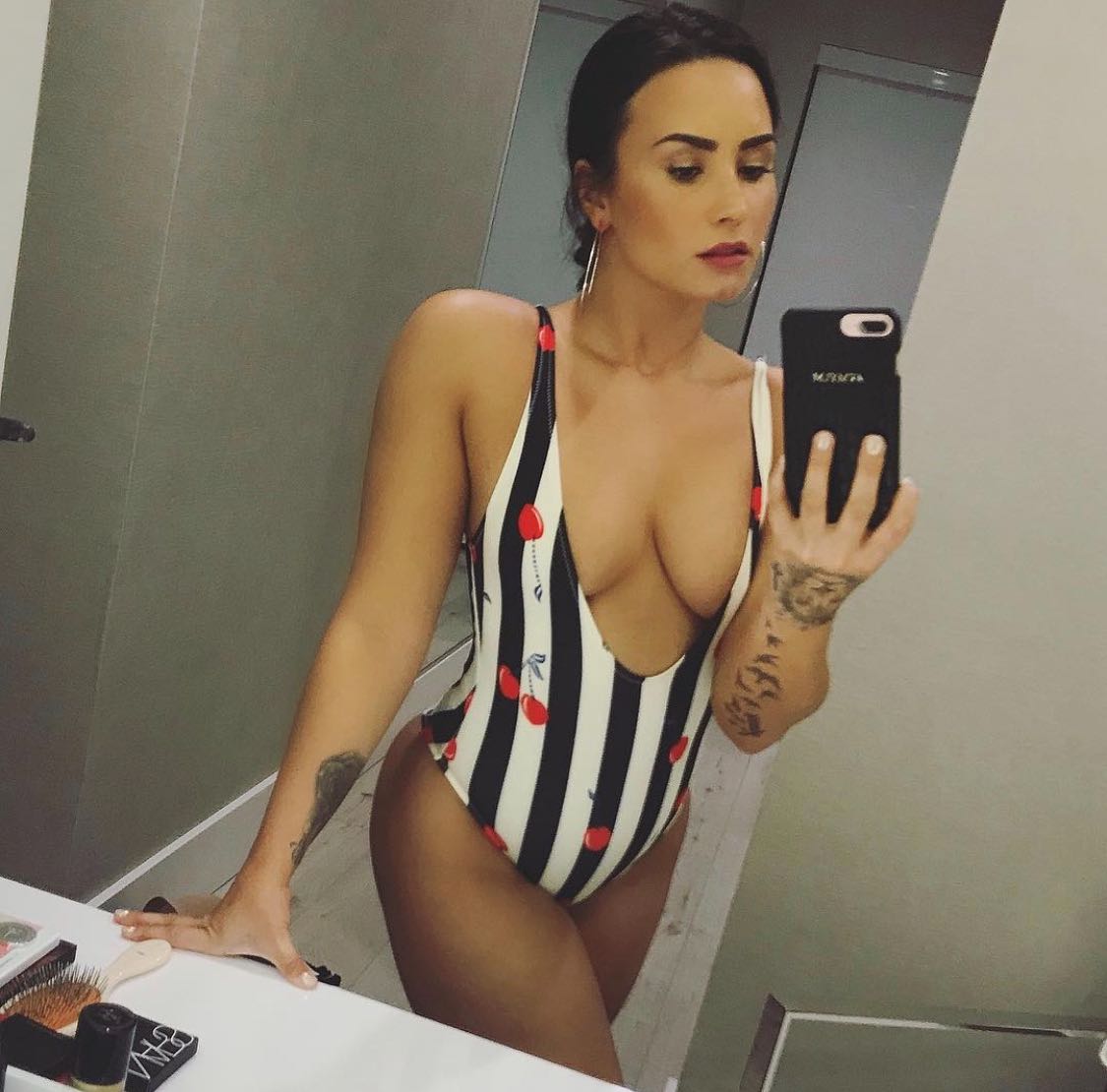 Demi Lovato Striped Cutout One-Piece Swimsuit