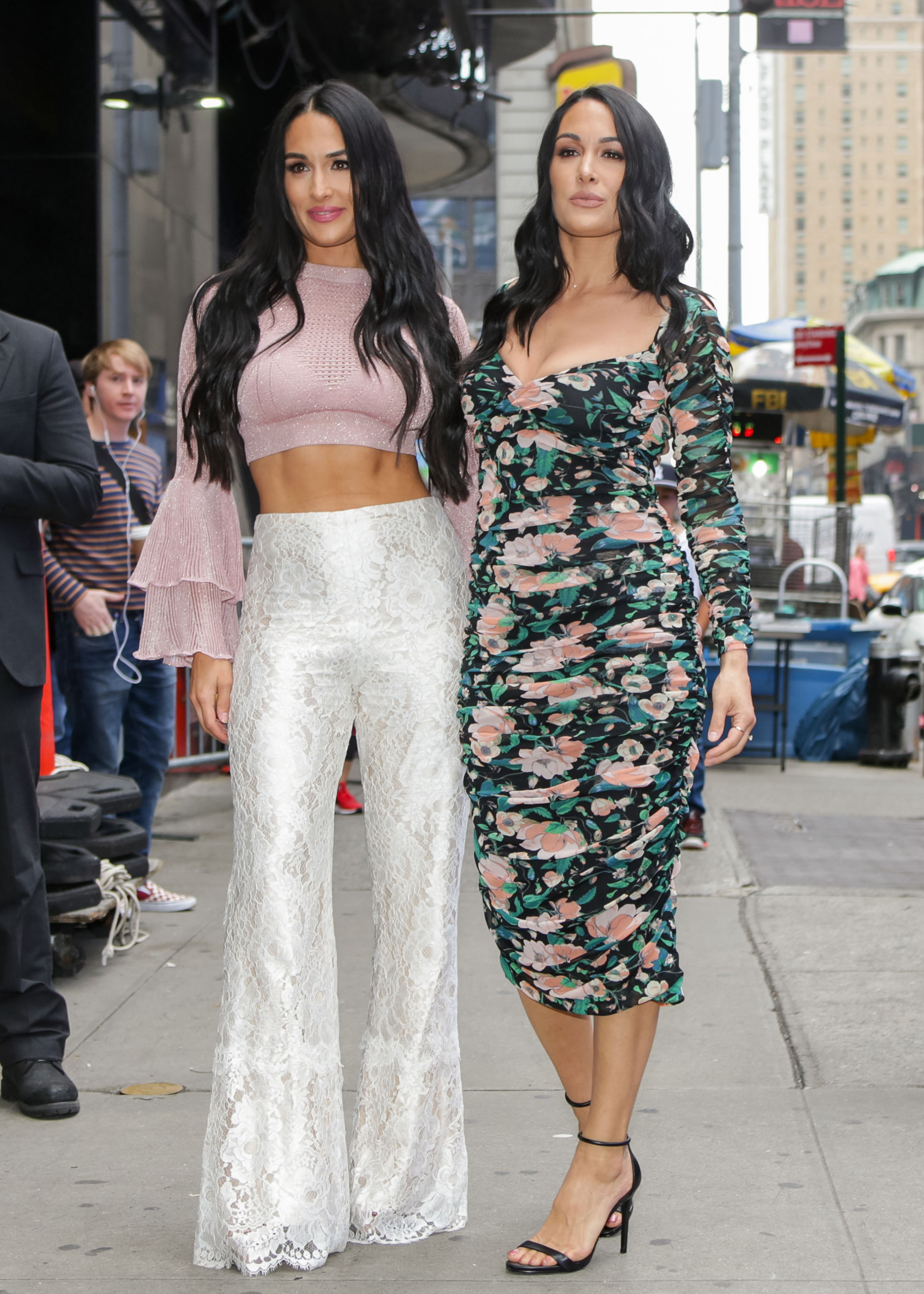Nikki and Brie Bella step out in all-white ensembles for a lunch outing in  Studio