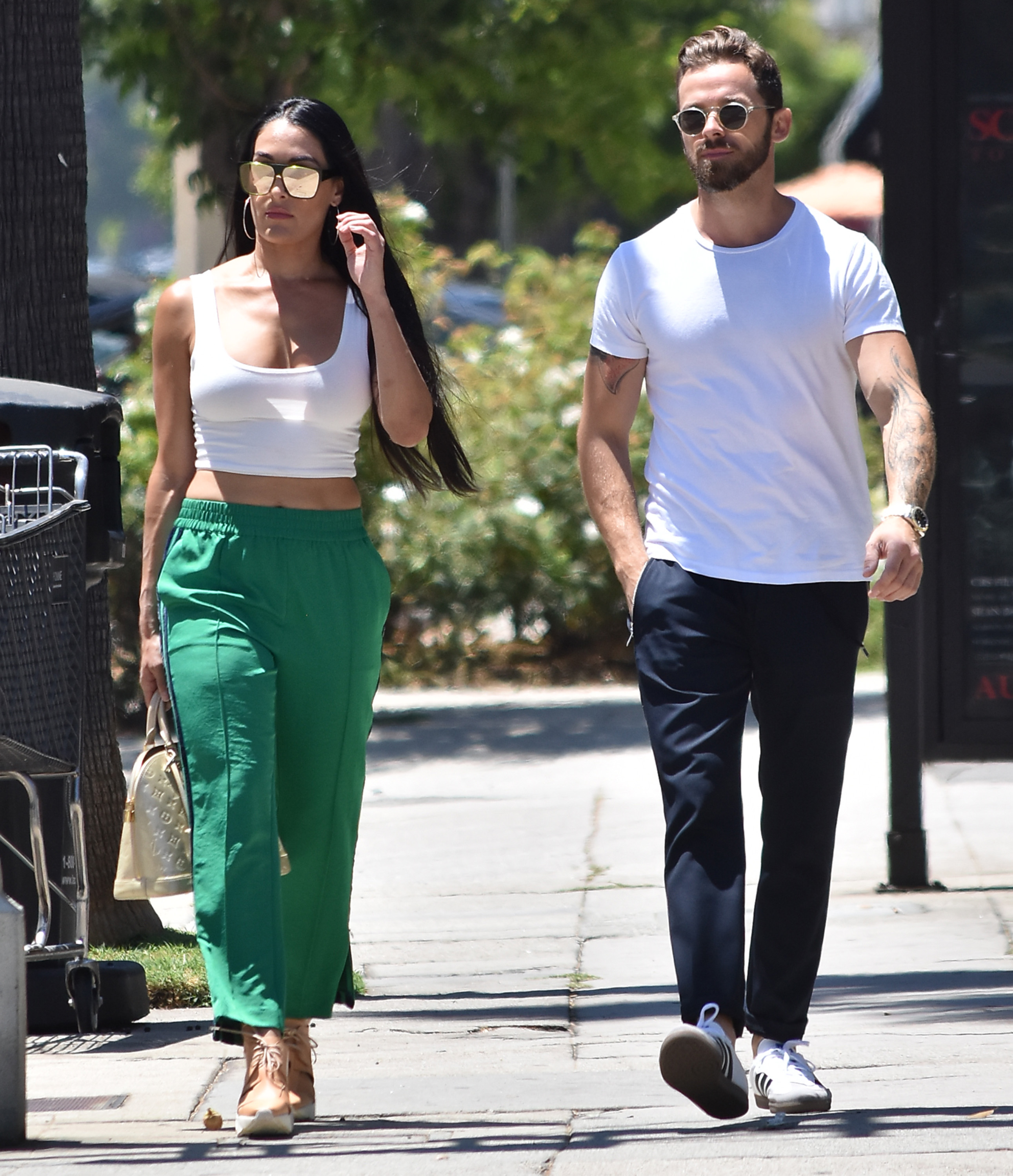 Nikki Bella & Artem Chigvintsev Look Smitten Leaving A Party In LA