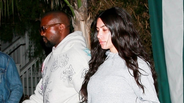 Kim Kardashian Wears a Zip-Up Swimsuit as a Top — You Can Too