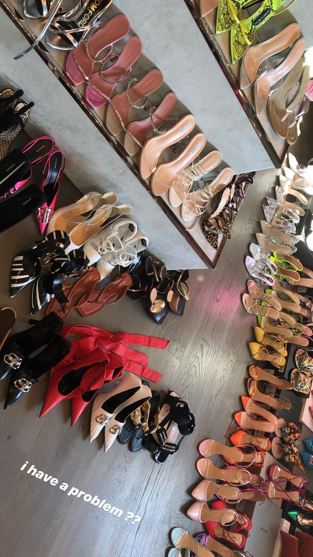 Kylie Jenner shows of her VERY expensive and colorful shoe collection in  new clip