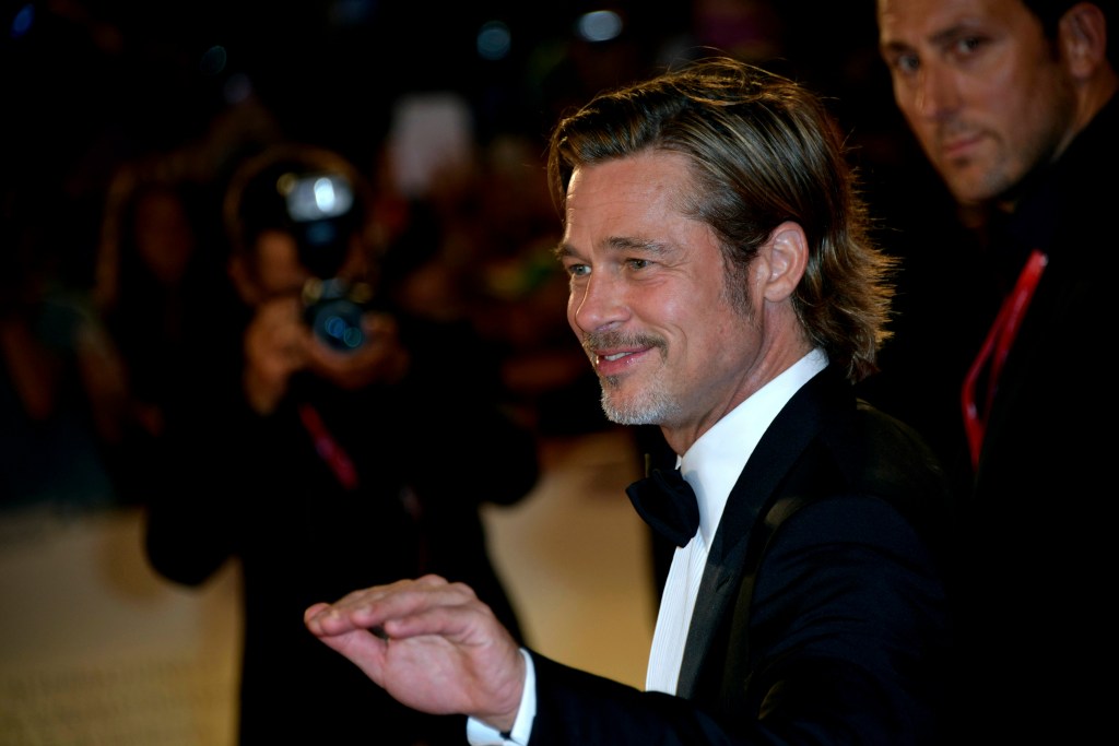 Brad Pitt Wearing a Suit and Smiling