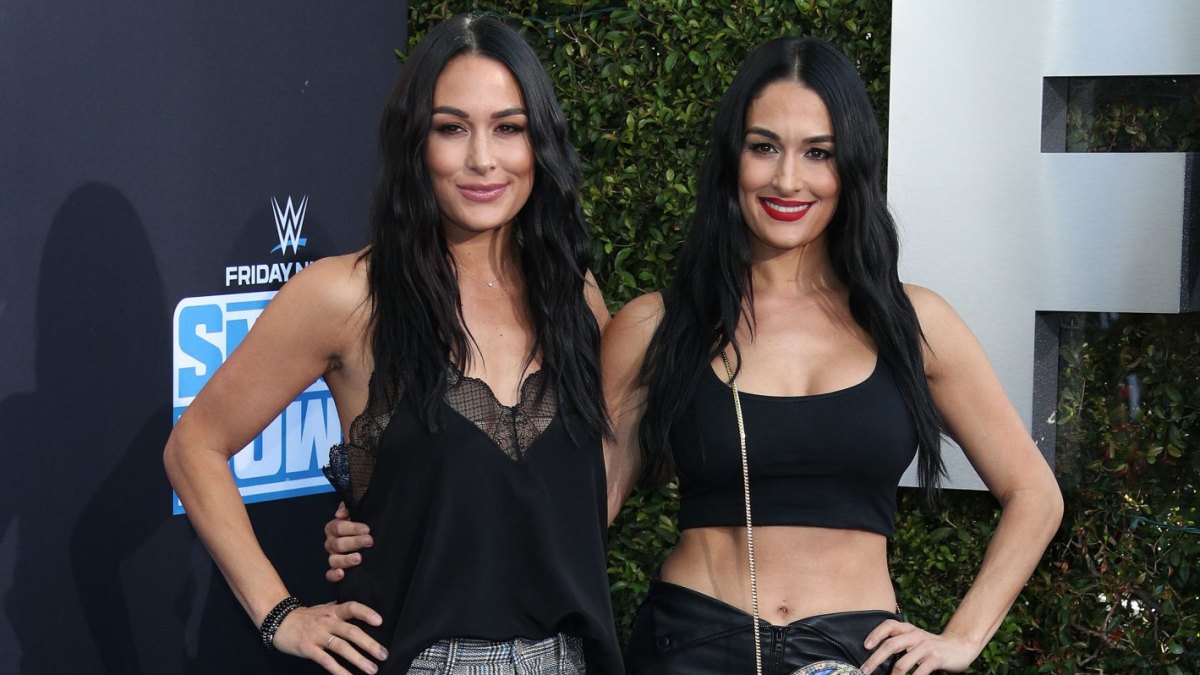 1200px x 675px - Nikki Bella Flaunts Toned Abs With Twin Sister Brie at WWE Anniversary
