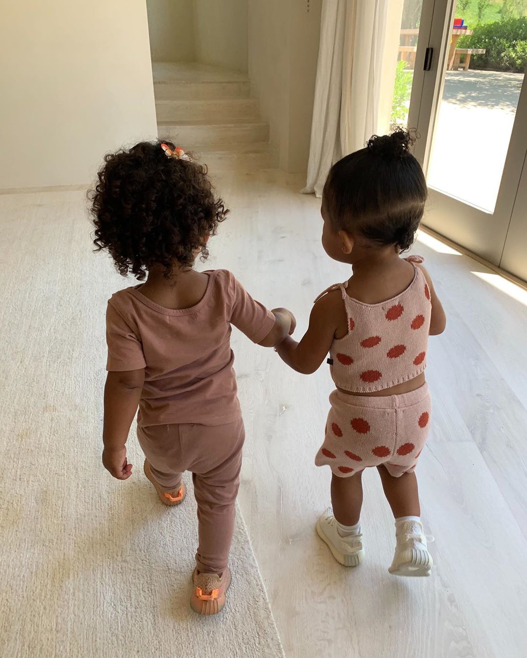 Stormi Webster and Chicago West Hold Hands