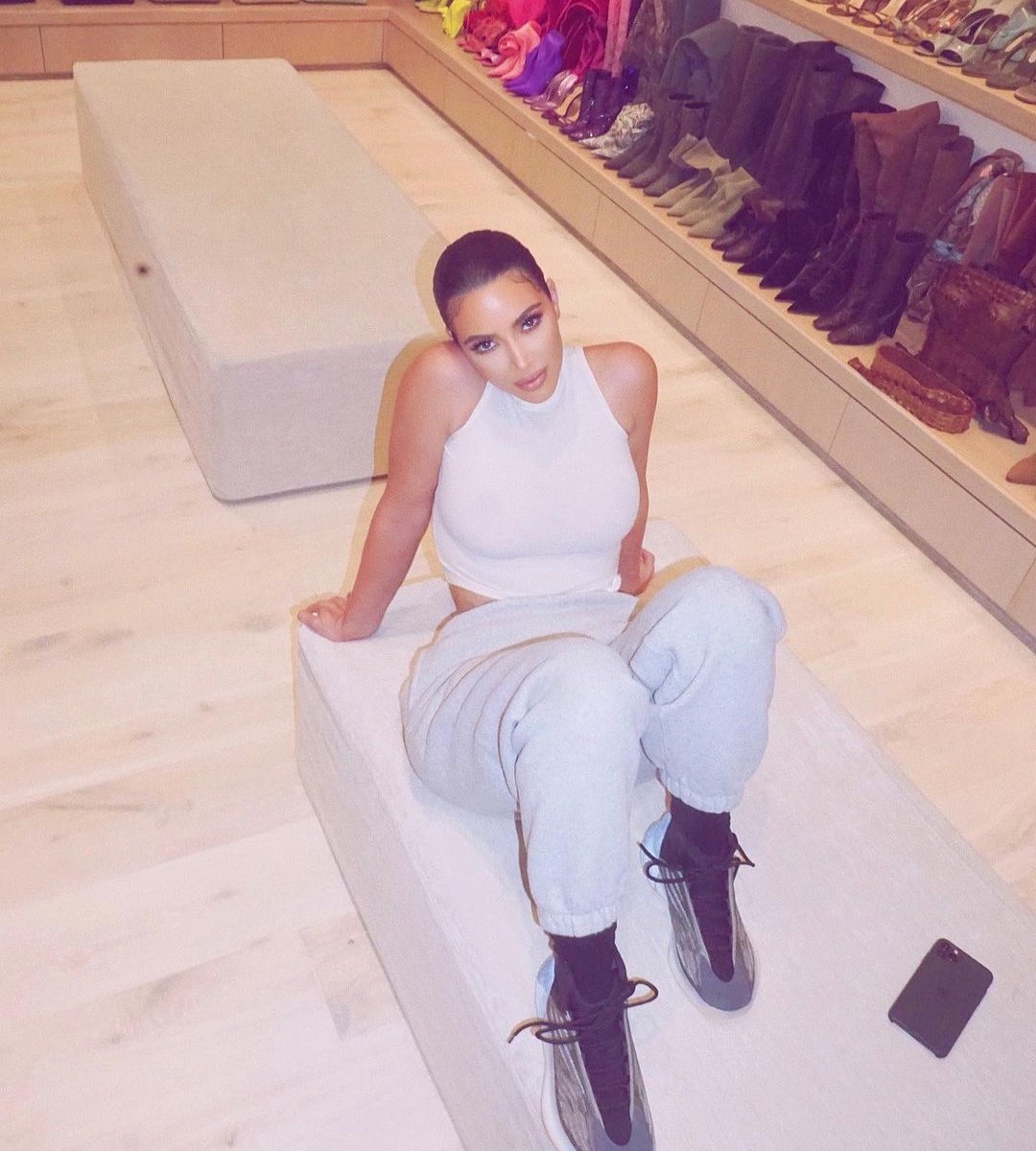Kim Kardashian strikes a pose in her cavernous closet