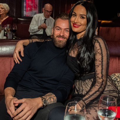 Nikki Bella flashes ring in first public outing with Artem
