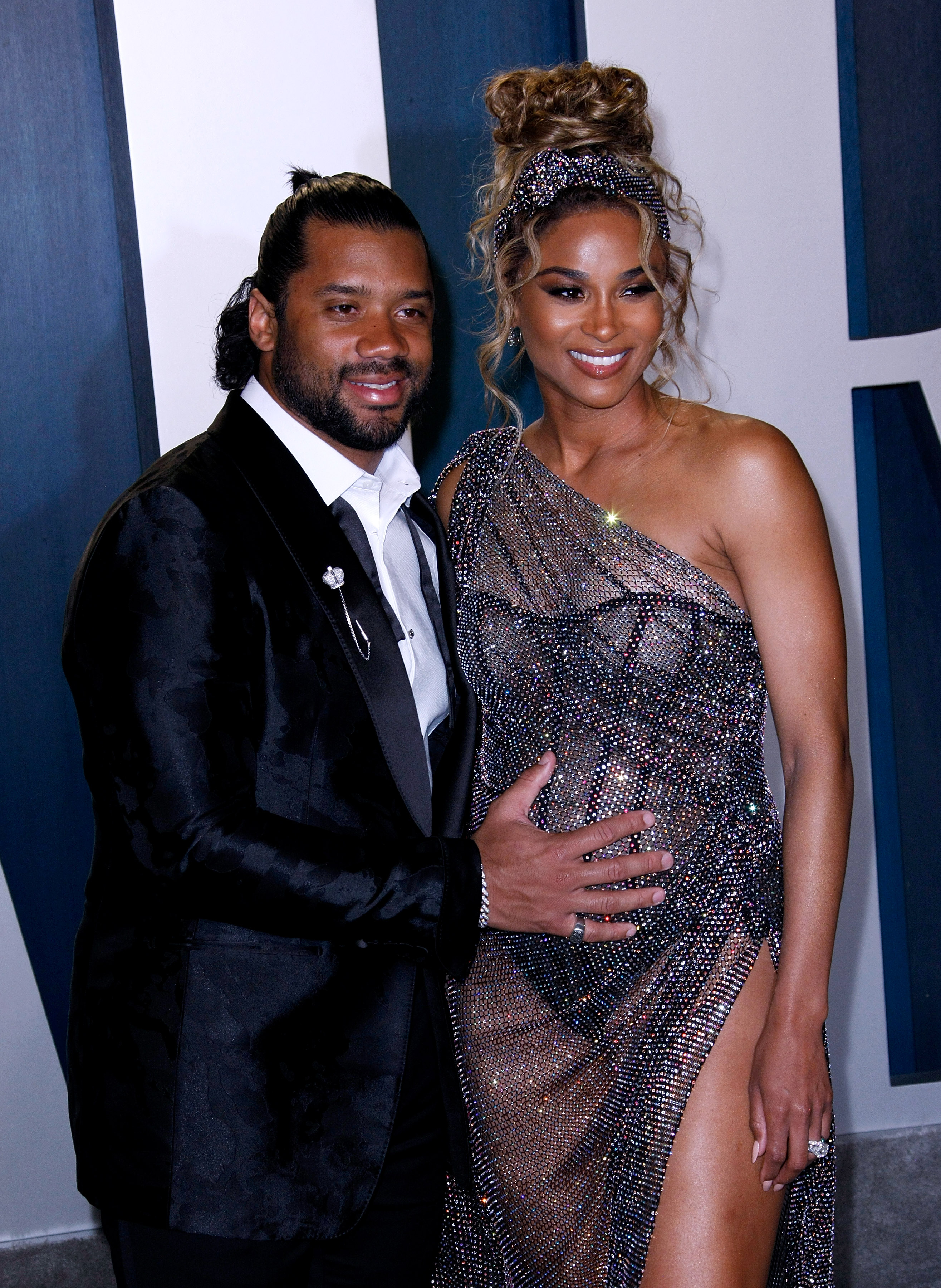 Russell Wilson Cradles Ciara's Baby Bump at Oscars Afterparty: Photos