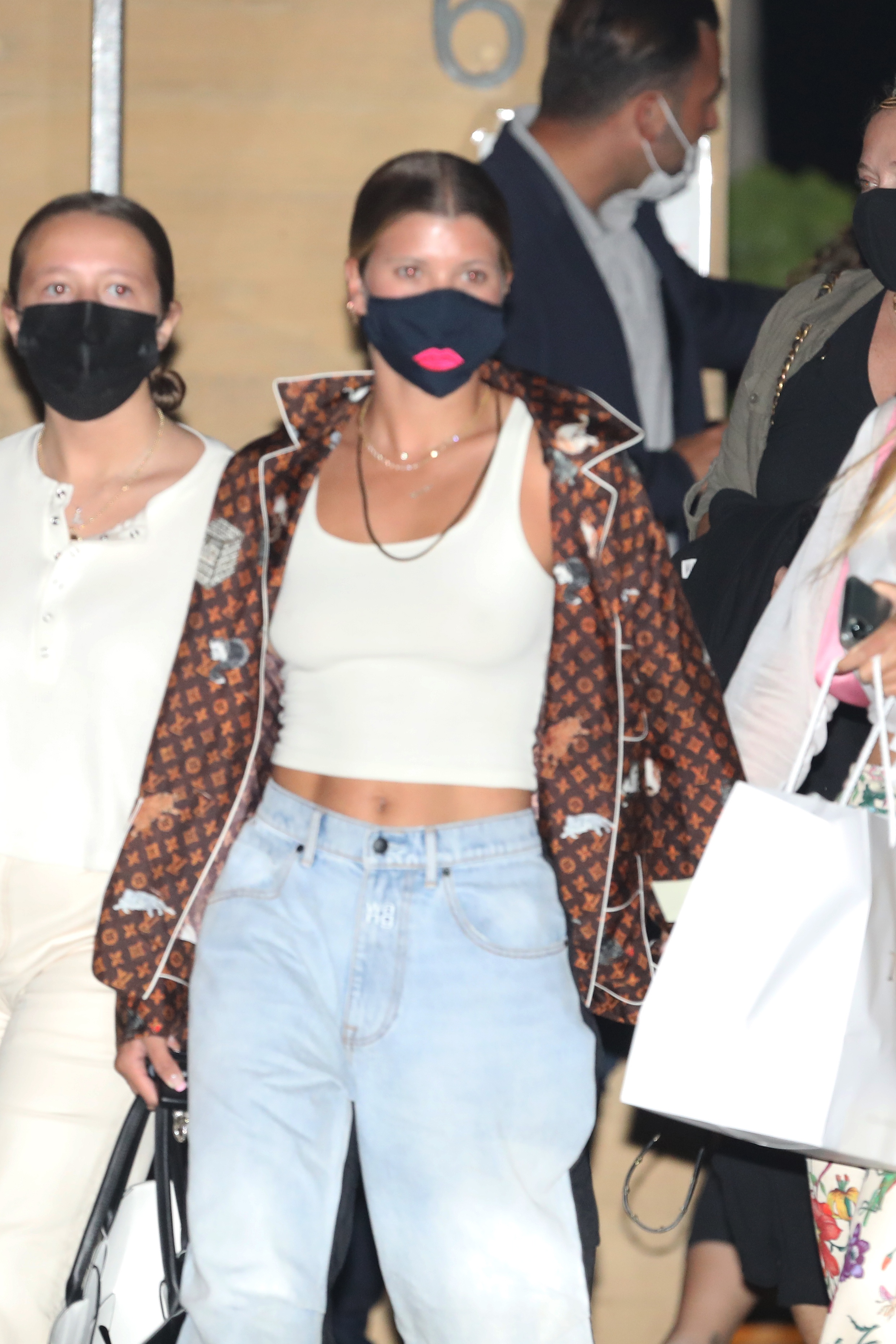 Sofia Richie In Tiger Mist With Louis Vuitton Bags