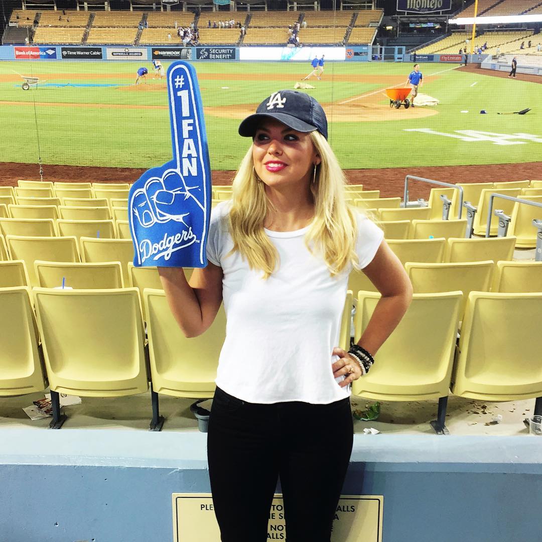 The Bachelorette's Hannah Brown throws the first pitch at the