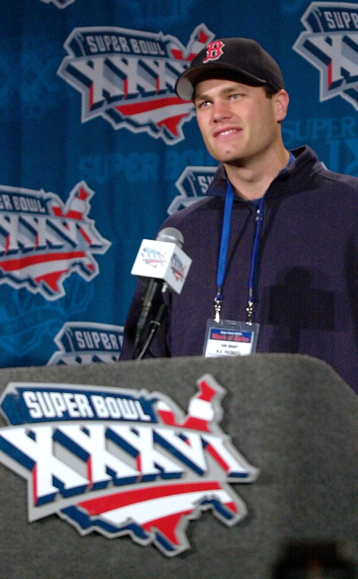 Tom Brady looks unrecognizable as he plays BASEBALL as a teen