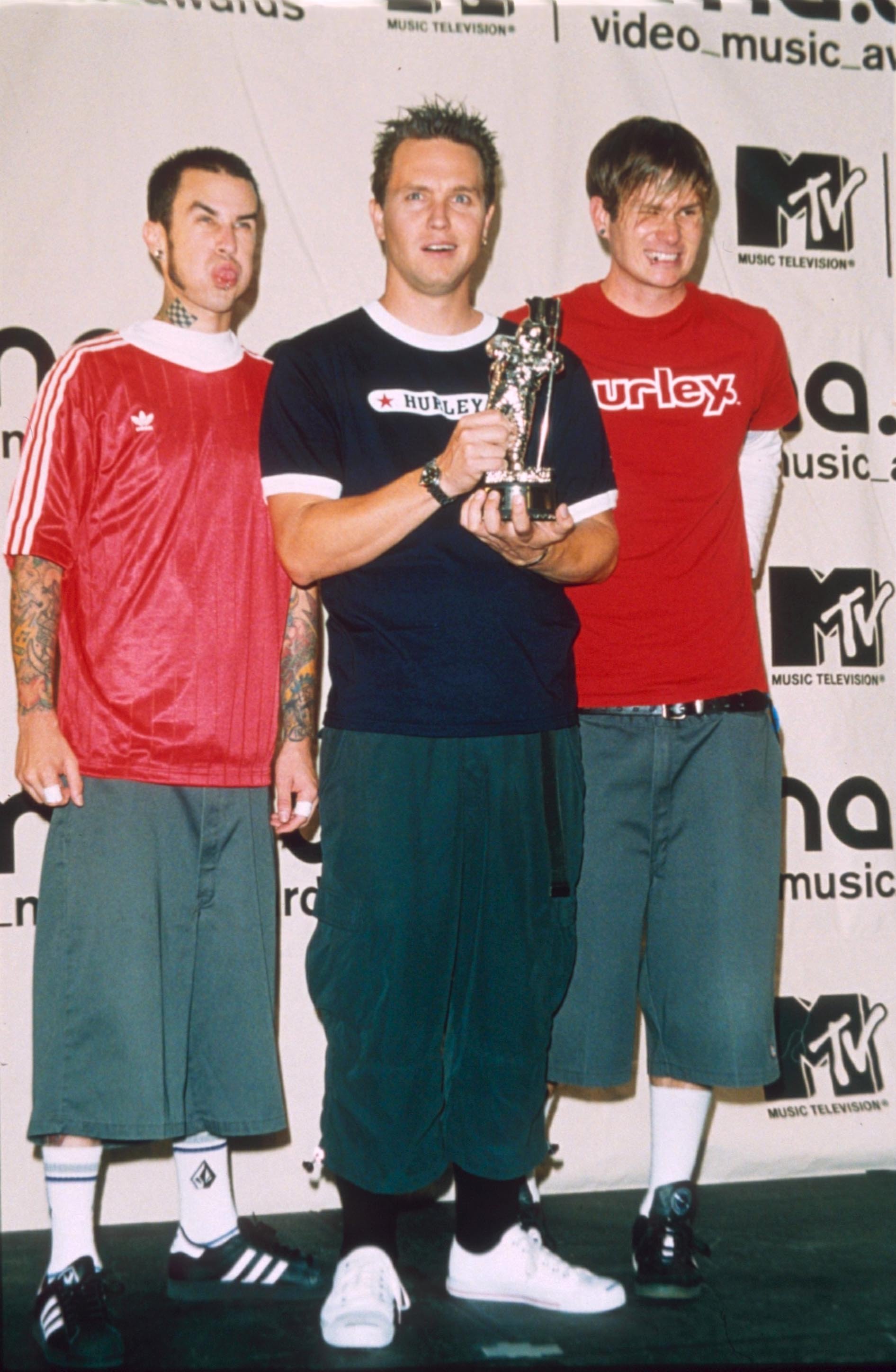 Blink-182 Members Young and Now: Mark Hoppus, Travis Barker | Life & Style