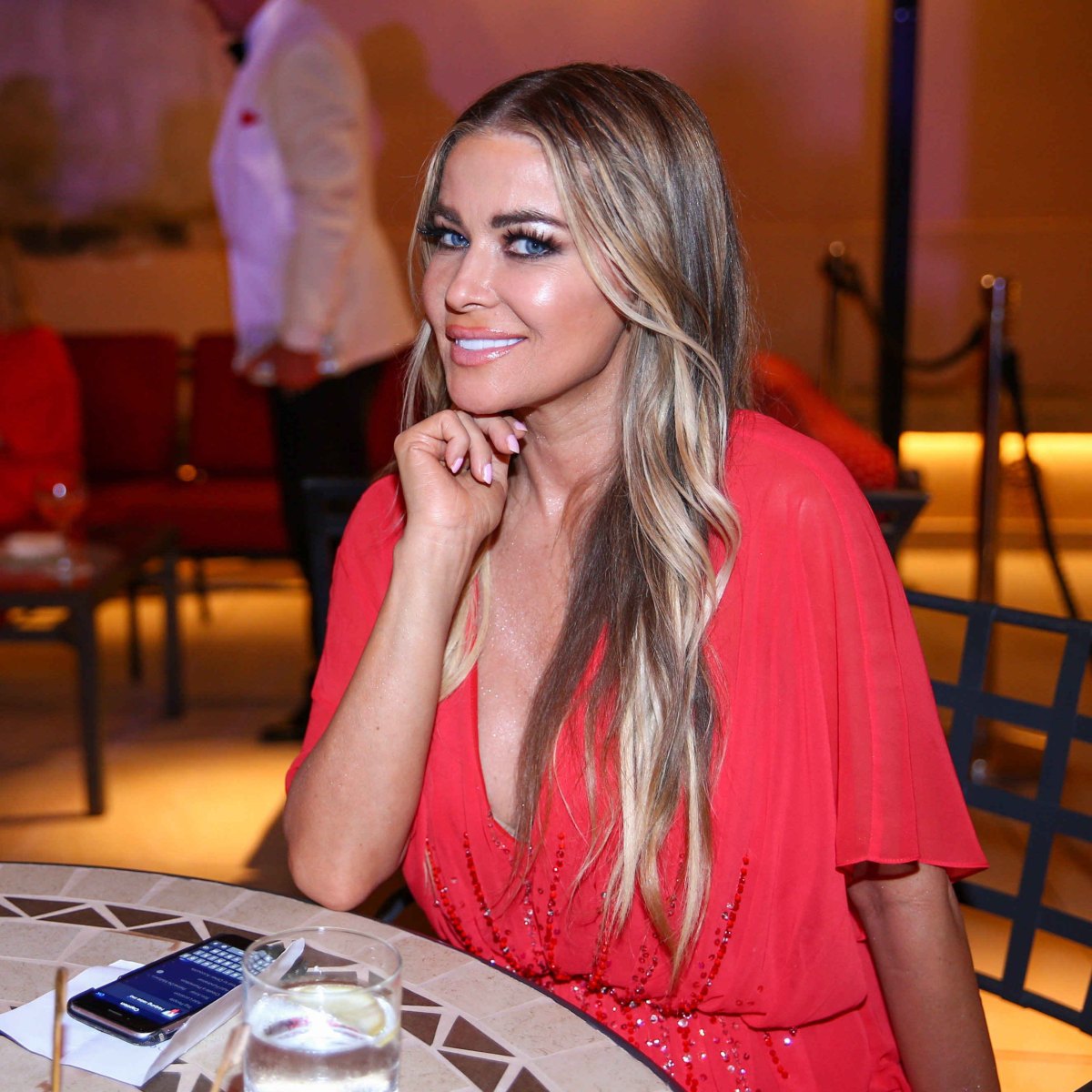 How does she do it? Carmen Electra looks stunning as she appears