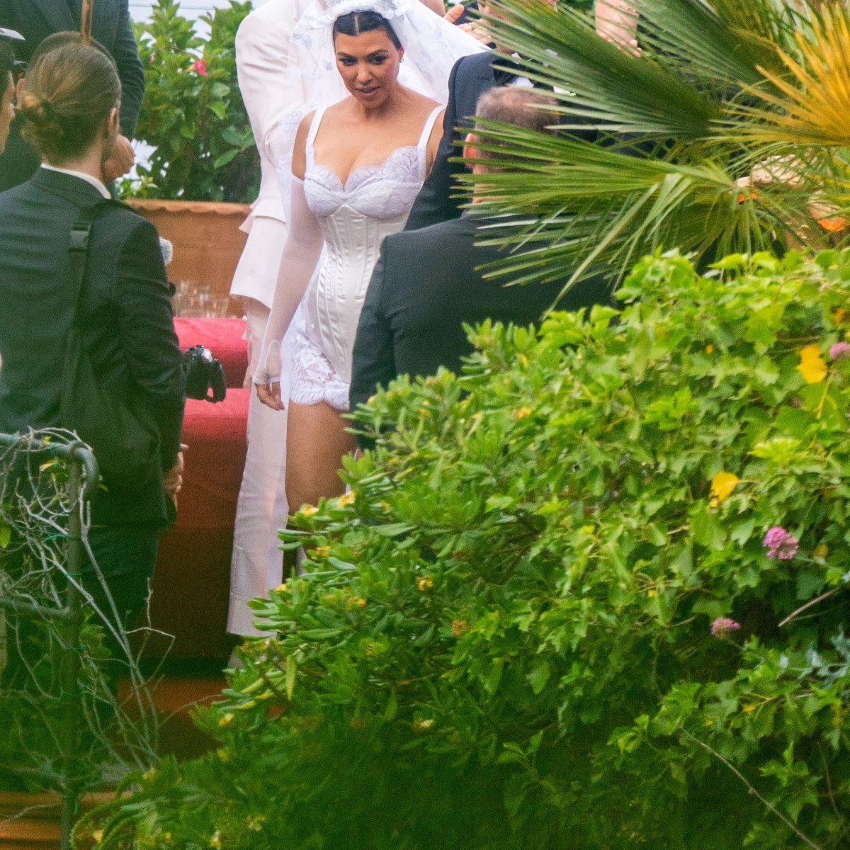8 Kardashian wedding dresses, from Kourtney and Travis Barker's
