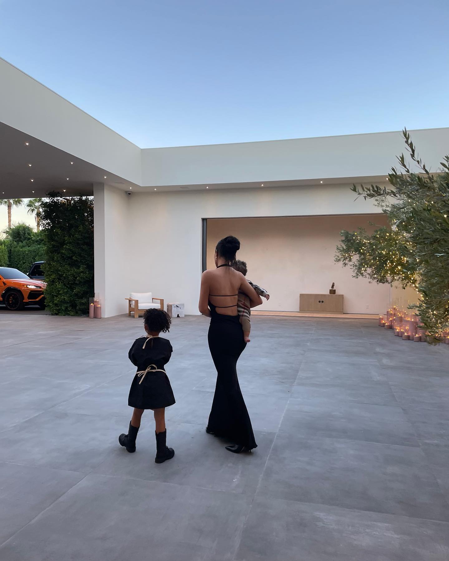 Kylie Jenner goes chic in champagne as she poses for snap with Stormi