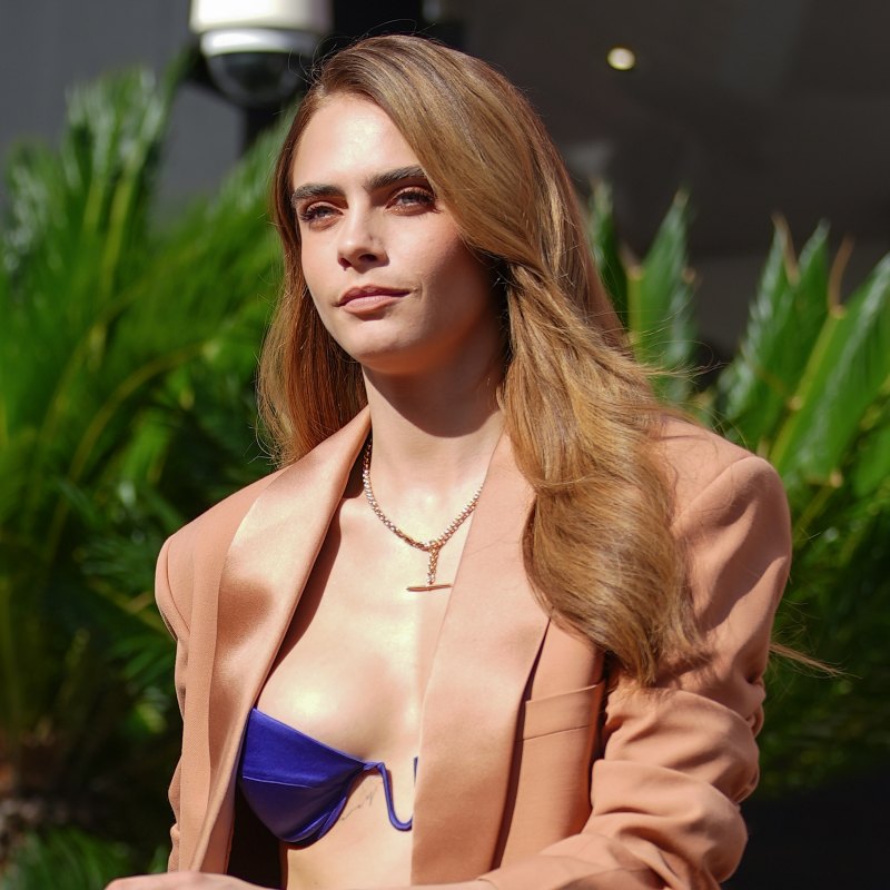 Cara Delevingne's Blue Bra & Tan Suit For 'Planet Sex:' Photos