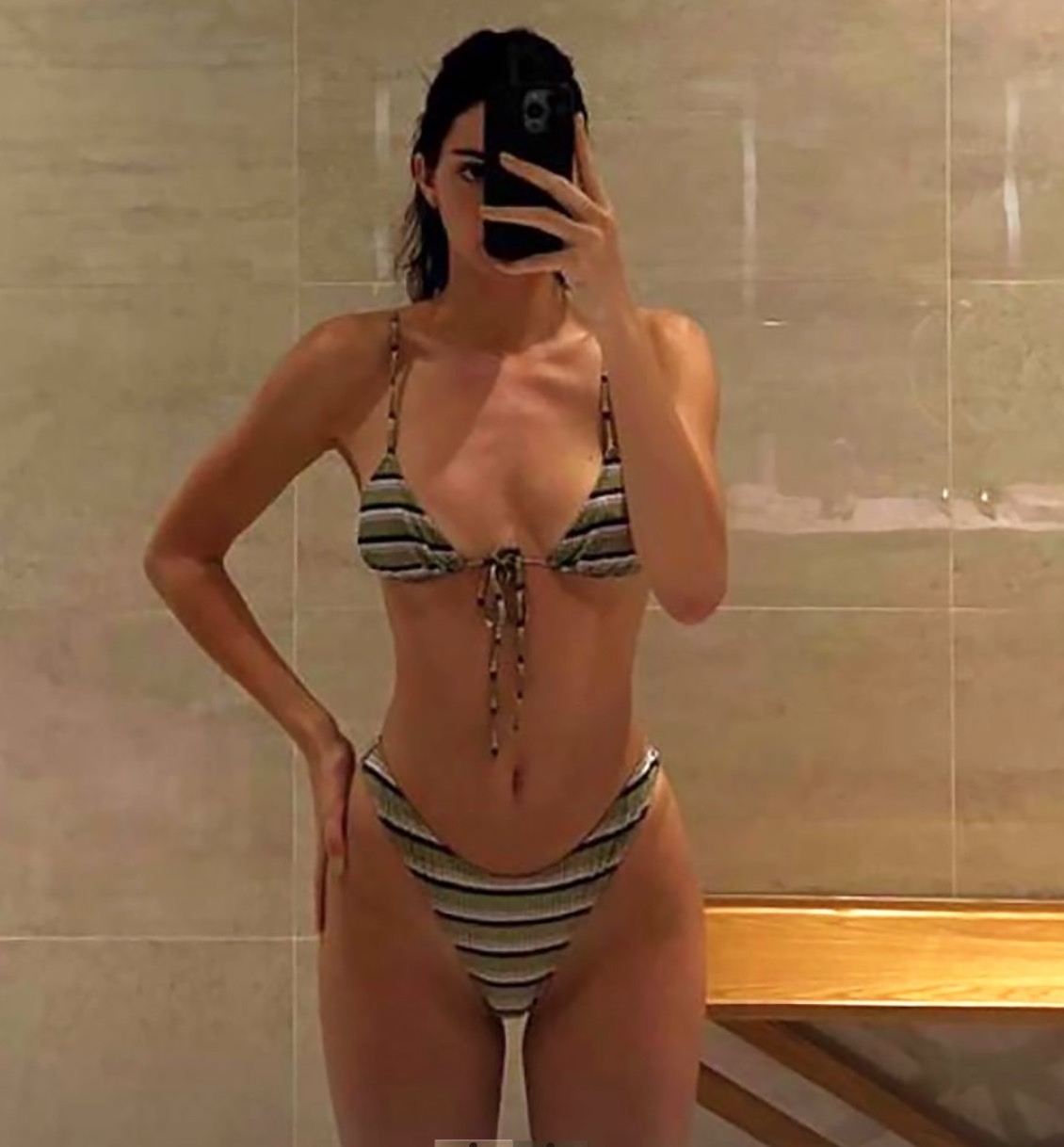 Kendall Jenner Wore an Itty-Bitty Orange Thong Bikini in Her First