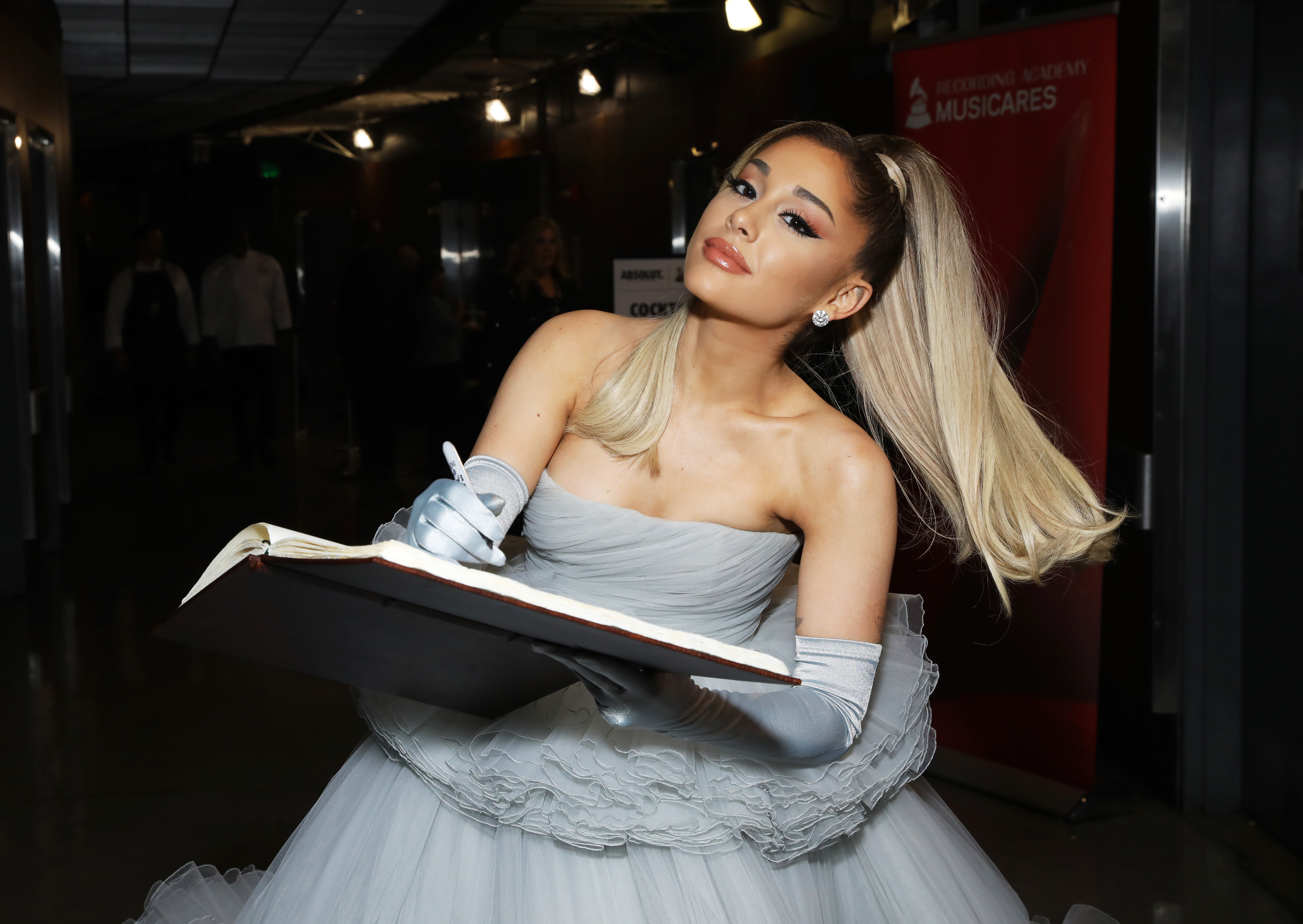 Ariana Grande Posts Stylish Photo In A Silver Dress As She Gets Emotional  Over Botox And Filler Use